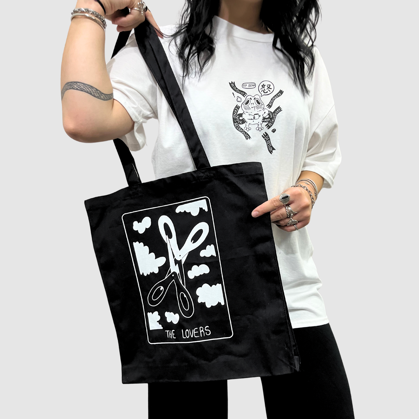 The lovers tarot card black tote bag