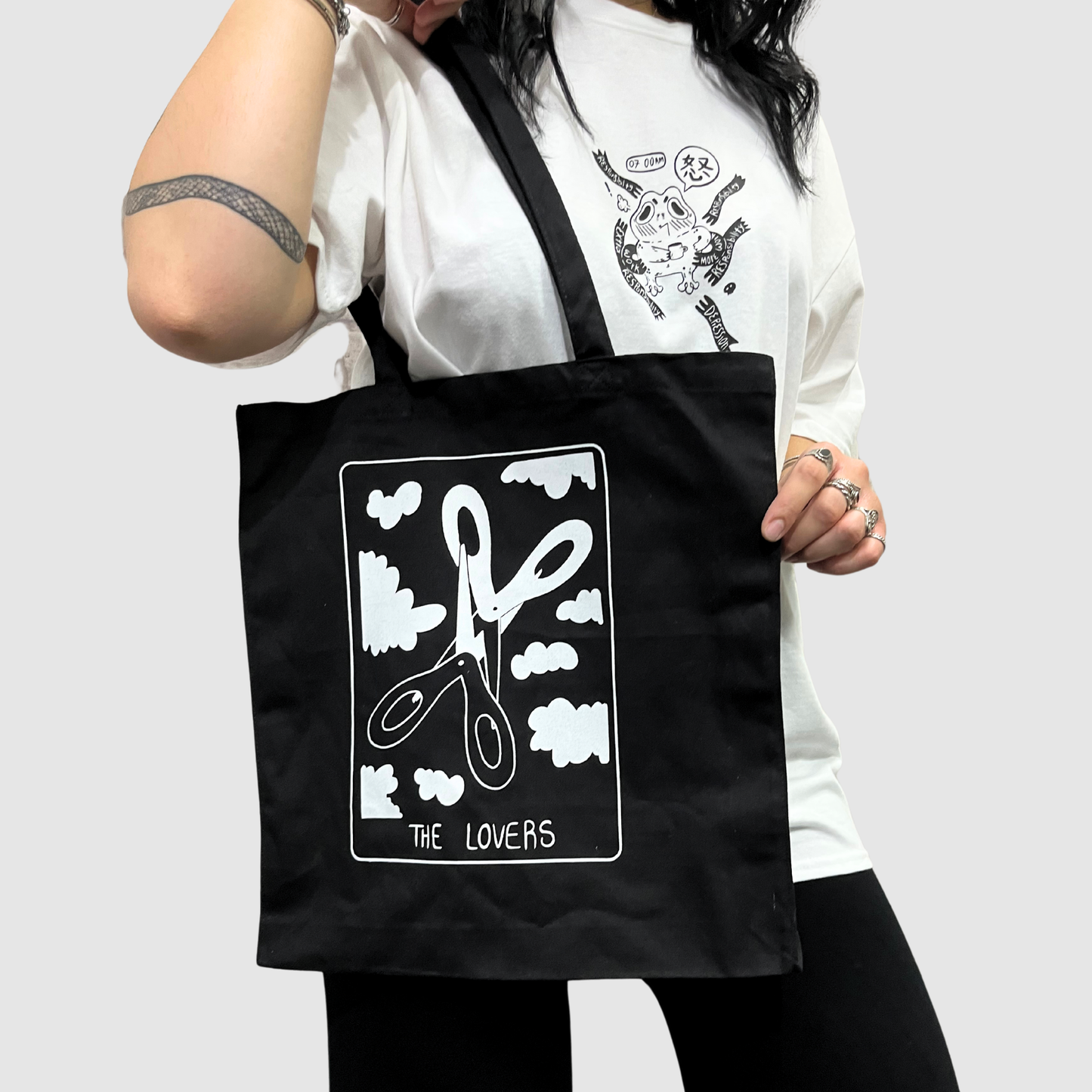 The lovers tarot card black tote bag